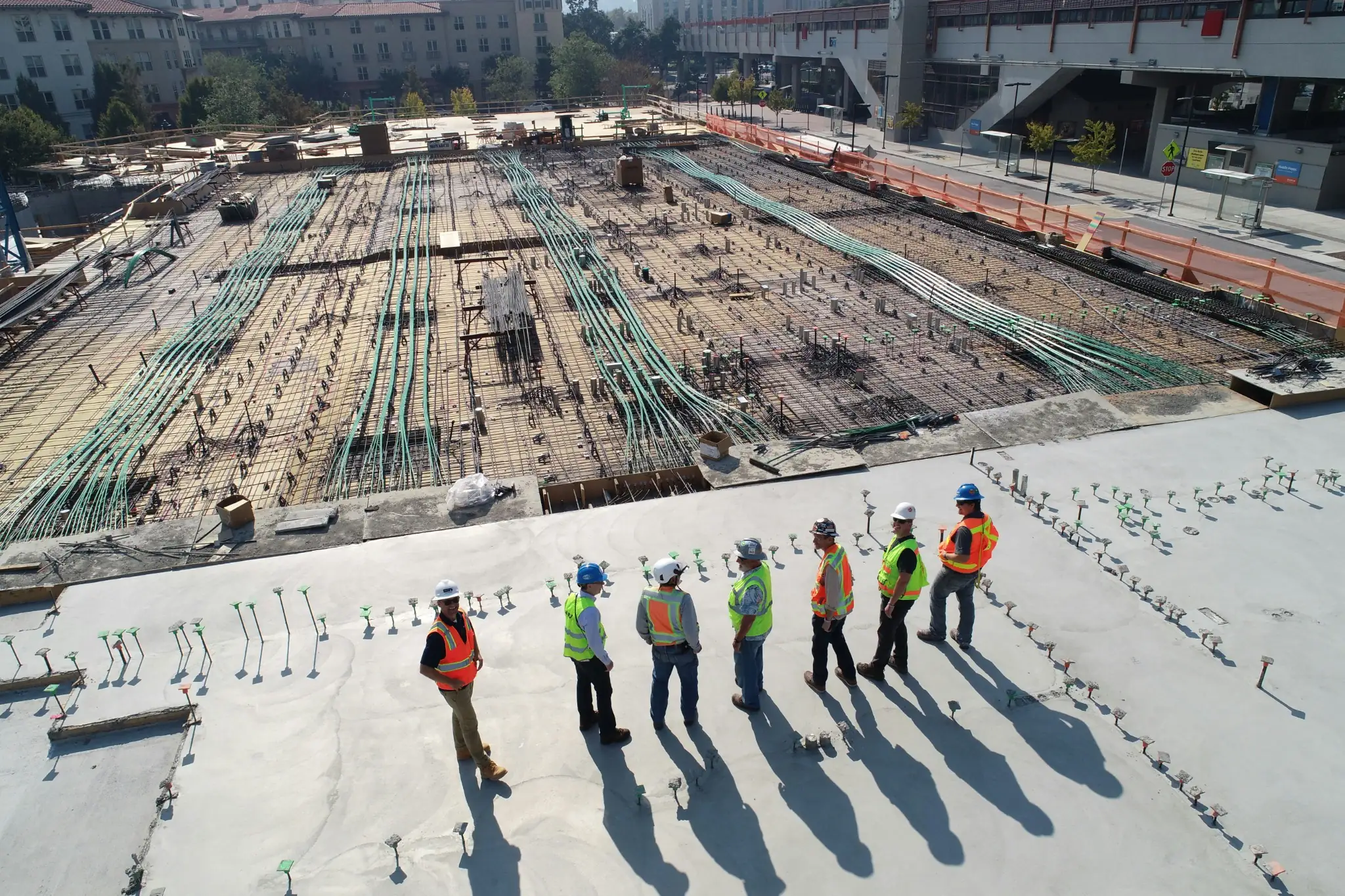 A construction team on site reviewing work in progress