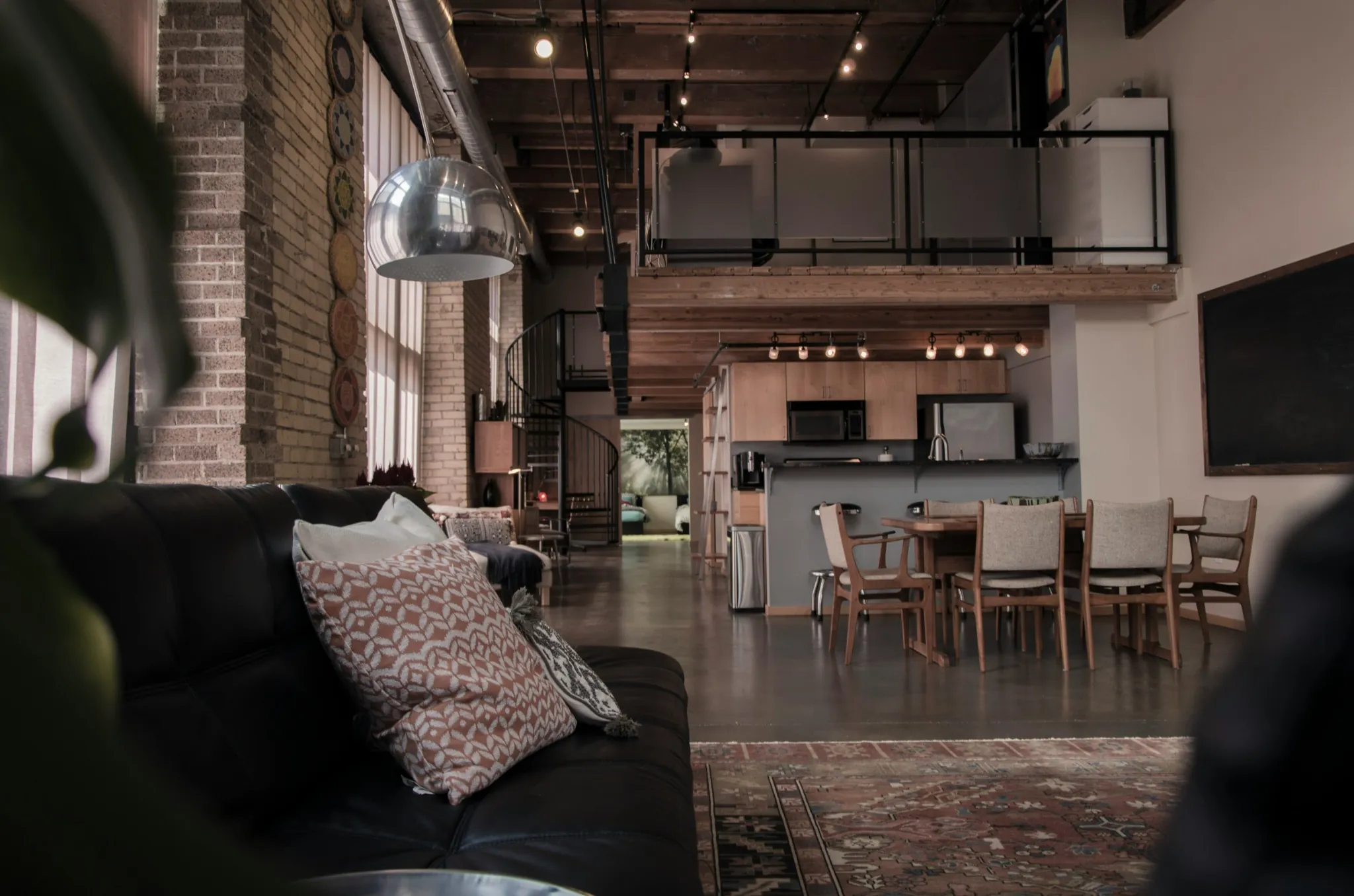 A residence at dusk with warm interior light